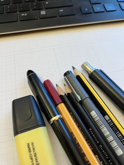 TOOLS OF THE DAY - pens, markers, pencils on custom notebook